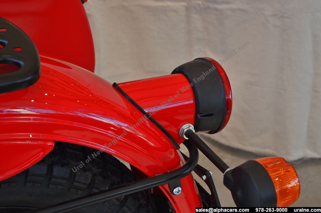 This photo shows the Retro Rear Motorcycle Light Adapter, as part of the complete Retro Rear Light Kit (including gasket and light assembly).