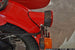 This photo shows the Retro Rear Motorcycle Light Adapter, as part of the complete Retro Rear Light Kit (including gasket and light assembly).