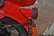 This photo shows the Retro Rear Motorcycle Light Adapter, as part of the complete Retro Rear Light Kit (including gasket and light assembly).